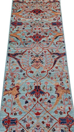 Backside of handmade New Farahan rug showing knot structure and weave density