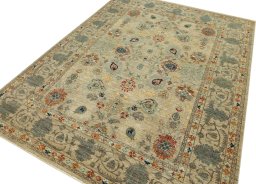 Backside of handmade New Farahan rug showing knot structure and weave density