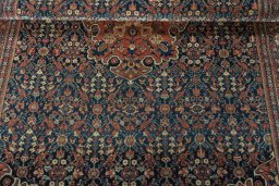 Close-up detail of 1930s Farahan rug from Iran / Persia showing Wool weave