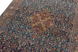 Backside of handmade 1930s Farahan rug showing knot structure and weave density