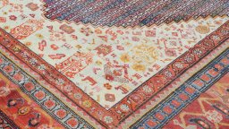 Central medallion detail of 1920s Farahan rug from Iran / Persia