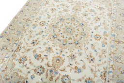 Backside of handmade New Kashan rug showing knot structure and weave density