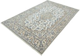 Corner detail of New Kashan rug showing border pattern and Wool pile