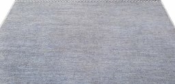 Backside of handmade New Morocco rug showing knot structure and weave density