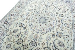 Backside of handmade 2000s Nain rug showing knot structure and weave density