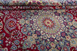 Close-up detail of 1970s Kerman rug from Iran / Persia showing Wool weave