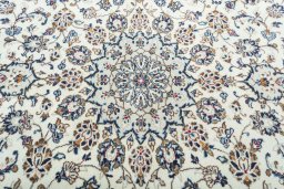 Central medallion detail of 2000s Kashan rug from Iran / Persia