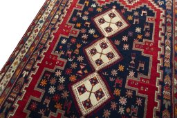 Backside of handmade 2000s Sirjan rug showing knot structure and weave density