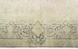Full view of 1950s Vintage rug from Pakistan, 398 × 304 cm in Red tones