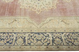 Corner detail of 1950s Vintage rug showing border pattern and Wool pile