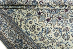 Close-up detail of 2000s Nain rug from Iran / Persia showing Wool weave