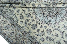 Close-up detail of 2000s Nain rug from Iran / Persia showing Wool weave