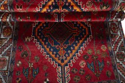 Full view of 2000s Shiraz rug from Iran / Persia, 193 × 111 cm in Red tones