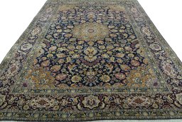 Surface texture of 2000s Kashan rug with natural Wool and intricate pattern