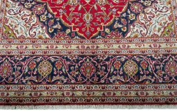 Full view of 2000s Kashan rug from Iran / Persia, 300 × 205 cm in Red tones