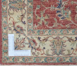 Corner detail of New Farahan rug showing border pattern and Wool pile
