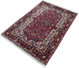 Corner detail of 2000s Jozan rug showing border pattern and Wool pile