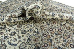Surface texture of 2000s Kashan rug with natural Wool and intricate pattern