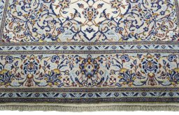 Full view of 2000s Kashan rug from Iran / Persia, 307 × 205 cm in Beige tones