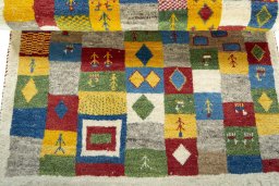 Full view of 2000s Persian Gabbeh rug from Pakistan, 146 × 98 cm in Multi Color tones