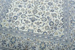 Close-up detail of 2000s Kashan rug from Iran / Persia showing Wool weave