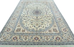 Surface texture of 2000s Nain rug with natural Wool and intricate pattern