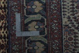Close-up detail of 1930s Hamedan rug from Iran / Persia showing Wool weave