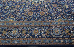 Corner detail of 2000s Kashmar rug showing border pattern and Wool pile