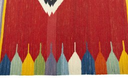 Close-up detail of New Kilim Sofre rug from Turkey showing Wool weave