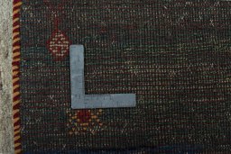 Close-up detail of 2000s Persian Gabbeh rug from Pakistan showing Wool weave