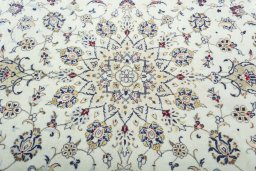 Central medallion detail of 2000s Kashan rug from Iran / Persia
