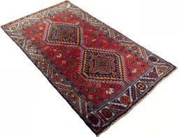 Close-up detail of 2000s Shiraz rug from Iran / Persia showing Wool weave