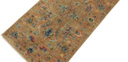 Backside of handmade New Farahan rug showing knot structure and weave density