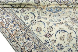 Close-up detail of New Nain rug from Iran / Persia showing Wool weave