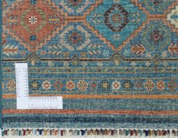 Corner detail of New Samarkand rug showing border pattern and Wool pile
