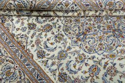 Close-up detail of 2000s Kashan rug from Iran / Persia showing Wool weave