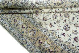 Close-up detail of 2000s Kashan rug from Iran / Persia showing Wool weave