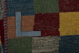 Close-up detail of 2000s Persian Gabbeh rug from Pakistan showing Wool weave