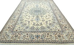 Surface texture of 2000s Nain rug with natural Wool and intricate pattern