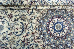 Close-up detail of 2000s Nain rug from Iran / Persia showing Wool weave