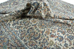 Surface texture of 2000s Yazd rug with natural Wool and intricate pattern