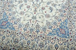 Close-up detail of 2000s Nain rug from Iran / Persia showing Wool weave