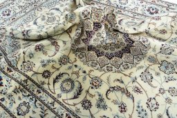 Surface texture of New Nain rug with natural Wool and intricate pattern