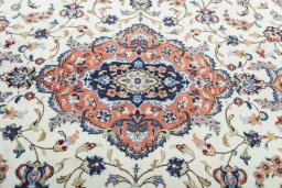 Central medallion detail of 2000s Kashan rug from Iran / Persia