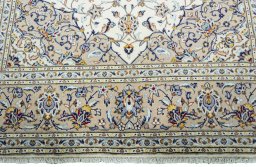 Full view of 2000s Kashan rug from Iran / Persia, 296 × 197 cm in Beige tones