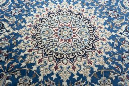 Central medallion detail of 2000s Nain rug from Iran / Persia