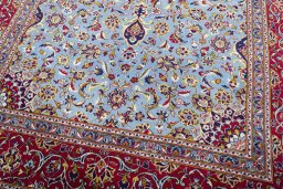 Close-up detail of 2000s Kashan rug from Iran / Persia showing Wool weave