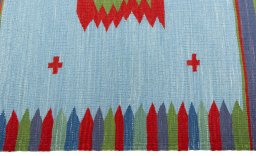 Close-up detail of New Kilim Sofre rug from Turkey showing Wool weave