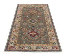 Surface texture of New Kazak rug with natural Wool and intricate pattern