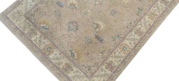 Backside of handmade New Farahan rug showing knot structure and weave density